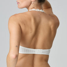 Load image into Gallery viewer, Ivory formed smooth underwire bra with a sweetheart-shaped cup. The straps may be worn normally but also adapt to a halter style. Lovely plunge line. The signature daisy straps complete the picture! This bra has the added advantage that it may also crossed over at the back. Fabric Content: Polyester: 48%, Polyamide: 43%, Elastane: 9%