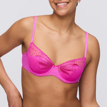 Load image into Gallery viewer, A half-formed plunge/balconnet shaped bra. This bra has all the benefits of a plunge but also all the shape and cover of a formed cup bra. It is a win-win situation. The straps are narrow but offer all the strength of a wider strap but without the bulk.
Fabric content: Elastane: 4%, Polyester: 60%, Polyamide: 36%