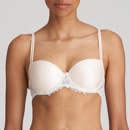 Jane formed and seamless cupped bra with the seductive balconnet neckline. Smooth opaque cups with floral lace trim. The wider wire ensures optimal comfort. Lifts the bust, creating a natural image. Perfect for multiple necklines. B to F cup.  Fabric content: Polyamide: 66%, Polyester: 26%, Elastane: 8%. Boudoir Cream.