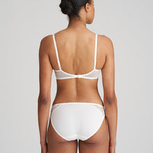 Load image into Gallery viewer, Jane formed and seamless cupped bra with the seductive balconnet neckline. Smooth opaque cups with floral lace trim. The wider wire ensures optimal comfort. Lifts the bust, creating a natural image. Perfect for multiple necklines. B to F cup. Fabric content: Polyamide: 66%, Polyester: 26%, Elastane: 8%. Ivory.