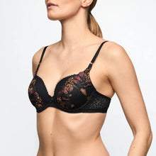 Load image into Gallery viewer, Black lace bra worn by a model on a light gray background