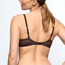 Load image into Gallery viewer, Woman wearing a black bralette on a plain background