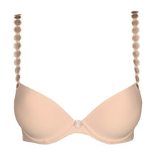 Load image into Gallery viewer, Caffé Latte formed plunge underwired bra. The shoulder straps have a playful circular design which can be converted into a halter style. The formed smooth finish of the cup is perfect under T/Shirts. Deep plunge offering invisibility under many outfits!
Fabric Content: Polyester: 36%, Polyamide: 38%, Elastane: 26%