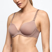 Load image into Gallery viewer, Woman wearing a beige bra with decorative straps on a white background