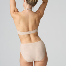 Load image into Gallery viewer, Caffé Latte formed smooth underwire bra with a sweetheart-shaped cup. The straps may be worn normally but also adapt to a halter style. Lovely plunge line. The signature daisy straps complete the picture! This bra has the added advantage that it may also crossed over at the back. Fabric Content: Polyester: 48%, Polyamide: 43%, Elastane: 9%