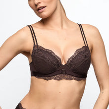 Load image into Gallery viewer, Woman wearing a dark brown lace bra on a plain background