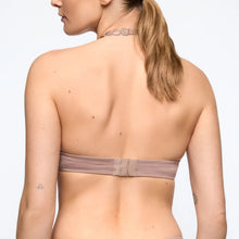 Load image into Gallery viewer, Woman wearing a light brown bralette on a plain background
