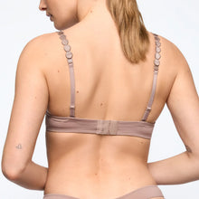 Load image into Gallery viewer, Woman wearing a beige bra against a light gray background