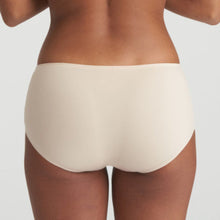Load image into Gallery viewer, Super smooth, super light Shorts without visible seams or stitching. The soft microfibre fits snugly over the bum and offers light control. A fine glossy border on the waistband adds a luxurious touch. No label on the inside and with a soft cotton gusset. These shorts are worn on the hip but offer full coverage on the bottom. Fabric Content: Polyamide: 81%, Elastane:15%, Cotton: 4%. CAFFÉ LATTE.