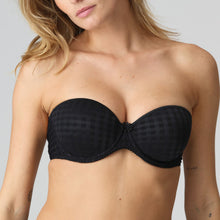 Load image into Gallery viewer, Black strapless formed cup underwire bra with a balconnet line. Straight back with silicone strip to give extra support when the bra is worn strapless. Excellent shape and support for those strapless occasions. May also be worn in a halter style. The signature daisy straps complete the picture! Fabric Content: Polyamide: 49%, Polyester: 41%, Elastane: 10%