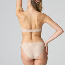 Load image into Gallery viewer, Caffé Latte strapless formed cup underwire bra with a balconnet line. Straight back with silicone strip to give extra support when the bra is worn strapless. Excellent shape and support for those strapless occasions. May also be worn in a halter style. The signature daisy straps complete the picture! Fabric Content: Polyamide: 49%, Polyester: 41%, Elastane: 10%