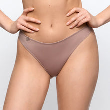 Load image into Gallery viewer, Person wearing a beige underwear on a plain background