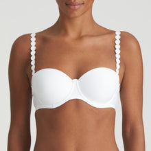 Load image into Gallery viewer, Pure White strapless balconnet underwired bra. The shoulder straps have a playful circular design which can be converted into a halter style. The formed smooth finish of the cup is perfect under T/Shirts. Perfect for strapless or normal wear. Fabric Content: Polyamide: 39%, Polyester: 35%, Elastane: 26%