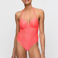Load image into Gallery viewer, Woman wearing a coral pink swimsuit on a light gray background