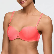 Load image into Gallery viewer, Woman wearing a pink bikini top against a plain background