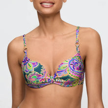 Load image into Gallery viewer, Woman wearing a colorful patterned bikini top on a white background