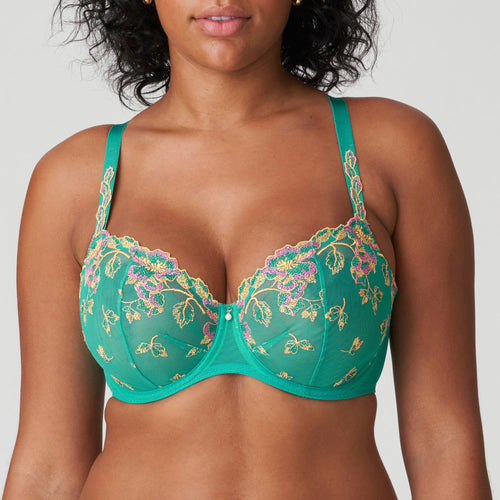 Lenca is a fashion in a beautiful colour. Sensual and airy balconnet bra with rich floral embroidery. The straps come with luxurious guipure lace, and the pearl at the centre-front adds yet another touch of luxury. The embroidery at the top of the cups ensures that the bra fits nicely, with total comfort. Sunny Teal is a tropical shade of green with ochre and fuchsia highlights. Looks great on both pale and dark skin.  Fabric content: Polyamide:75%, Elastane:14%, Polyester:11%