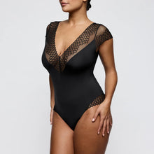 Load image into Gallery viewer, Black lace bodysuit worn by a model on a plain background