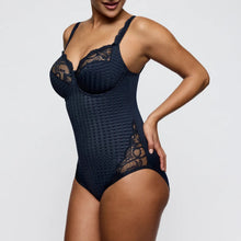 Load image into Gallery viewer, Navy blue lace bodysuit worn by a model on a light gray background