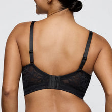 Load image into Gallery viewer, Black lace bra worn by a model on a plain background