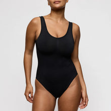 Load image into Gallery viewer, Black swimsuit worn by a model on a plain background