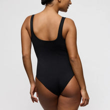 Load image into Gallery viewer, Person wearing a black swimsuit on a plain background