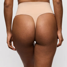 Load image into Gallery viewer, Beige underwear on a person against a plain background
