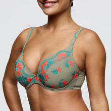 Load image into Gallery viewer, Woman wearing a green bra with floral embroidery on a plain background