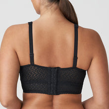 Load image into Gallery viewer, Famous for their beautifully crafted bras catering to the larger bust, Montara is a lovely member to the Prima Donna family. An all-lace non-wire bralette with a modern look, it has a pretty stretch cup. The longer line is for comfort and support.
Fabric: Polyamide: 89%, Elastane: 11%. Black.