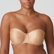Load image into Gallery viewer, Cognac. Low-key but elegant seamless underwired bra with detachable shoulder straps and pre-formed cups offer a smooth all over finish. The light cups add no bulk while supporting and lifting the bust. This creates a gorgeous round shape that is so typical of Satin.
Fabric Content: Polyamide: 61%, Elastane: 23%, Polyester: 16%