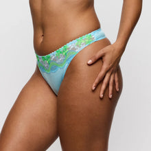 Load image into Gallery viewer, Light blue lace underwear with green floral details on a neutral background