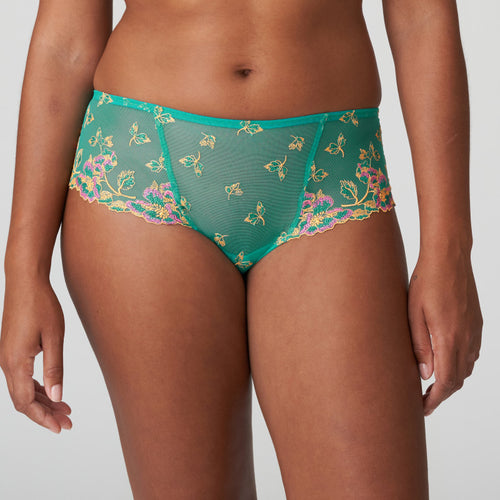 A stylish and luxurious G/String in soft microfiber. It is trimmed with broad panels of embroidery over the hips. Sunny Teal is a tropical shade of green with ochre and fuchsia highlights. Looks great on both pale and dark skin.  Fabric: Polyamide: 42%, Polyester: 42%, Elastane: 9%, Cotton: 7%