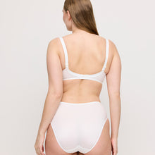 Load image into Gallery viewer, This is a classic seamless no frills T-Shirt underwire bra. With its plain straps and moulded cups, it features a smooth finish under t/shirts, polo shirts and knitted fabrics. The sturdy preformed cups support and lift the bust, creating a perfect rounded shape that is so typical of the Satin range.
Fabric Content: Polyamide: 58%, Elastane: 24%, Polyester: 18%.