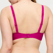 Load image into Gallery viewer, Person wearing a bright pink bralette on a plain background