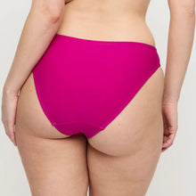Load image into Gallery viewer, Person wearing bright pink high-waisted underwear on a plain background