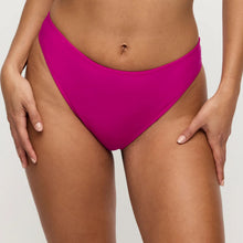 Load image into Gallery viewer, Person wearing bright pink high-waisted bikini bottoms on a neutral background