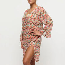 Load image into Gallery viewer, Woman wearing a patterned dress on a white background