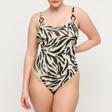 Load image into Gallery viewer, Woman wearing a zebra print swimsuit on a plain background