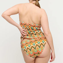 Load image into Gallery viewer, Woman wearing a colorful zigzag patterned swimsuit on a plain background