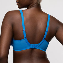 Load image into Gallery viewer, Blue bra worn by a person on a plain background
