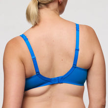 Load image into Gallery viewer, Blue bra worn by a person on a plain background