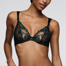 Load image into Gallery viewer, Woman wearing a black lace bralette against a plain background
