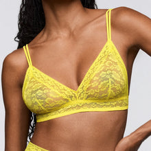 Load image into Gallery viewer, Yellow lace bra worn by a model on a plain background
