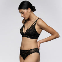 Load image into Gallery viewer, Woman wearing a black lace lingerie set on a plain background
