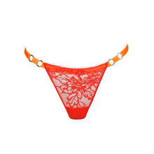 Load image into Gallery viewer, Red lace thong with gold accents on a white background