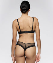 Load image into Gallery viewer, Person wearing a black lingerie set on a plain background