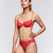 Load image into Gallery viewer, Woman wearing a red lace lingerie set on a plain background