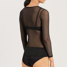 Load image into Gallery viewer, Image of the back.
Woman wearing a black sheer long-sleeve top with a round neck. The Finishes are simple in the same material.
The bottom reaches the hip.
