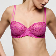 Load image into Gallery viewer, Pink lace bra worn by a model on a plain background