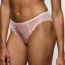 Load image into Gallery viewer, Pink lace underwear worn by a person on a plain background